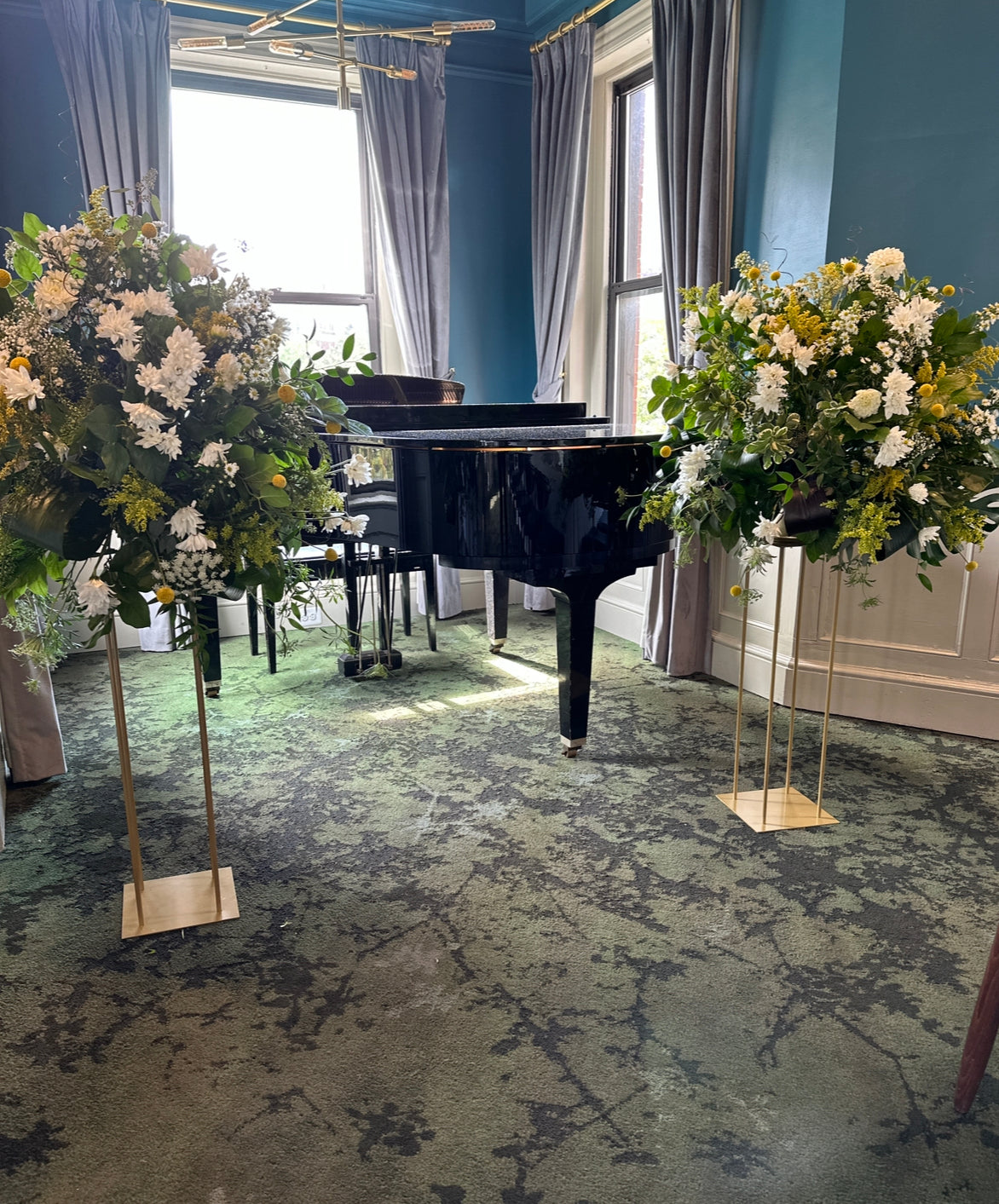 Tall Floral Centerpiece on Raised Gold Frame